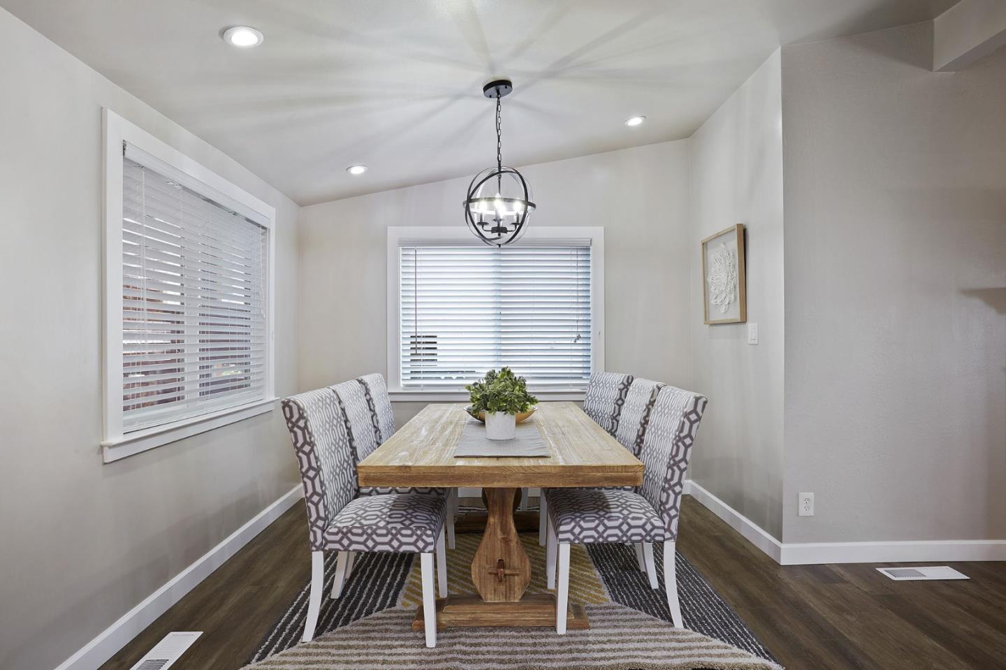 1015 Sycamore Drive Millbrae, CA 94030 - Photo 4 of 26 a view of a dining room with furniture window and wooden floor
