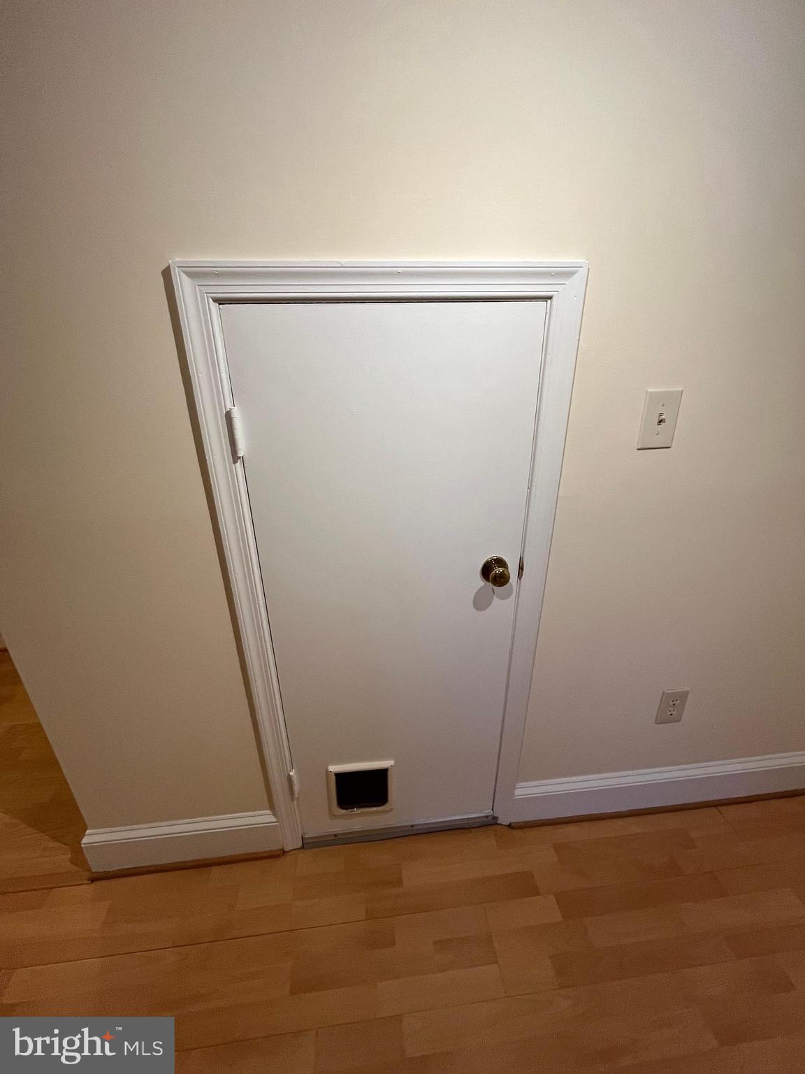 1835 16th Street Northwest, Unit 1 Washington, DC 20009 - Photo 26 of 32 an empty room with wooden floor and entrance