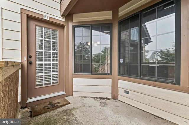 a view of entrance gate of a house
