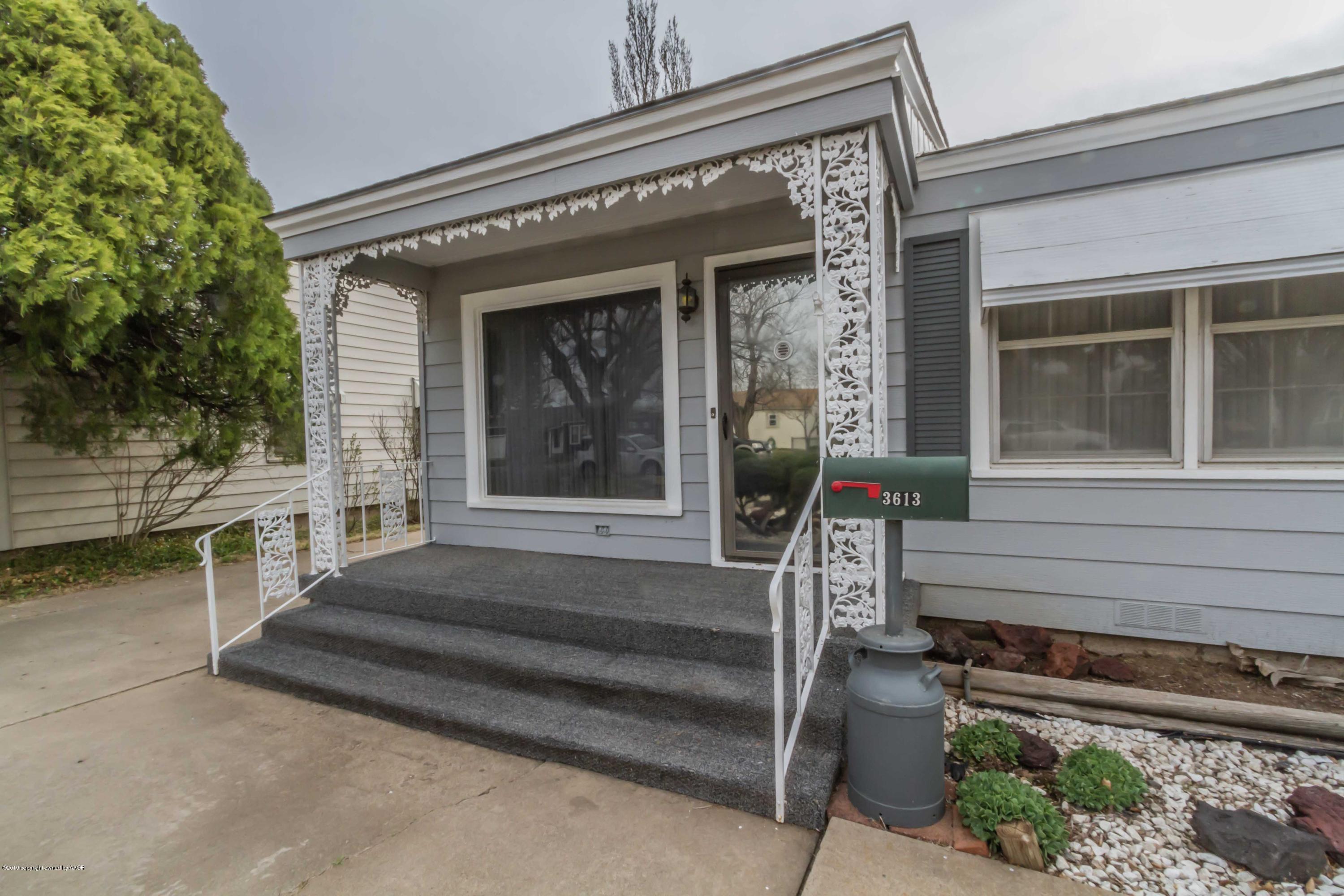 a front view of a house with a porch