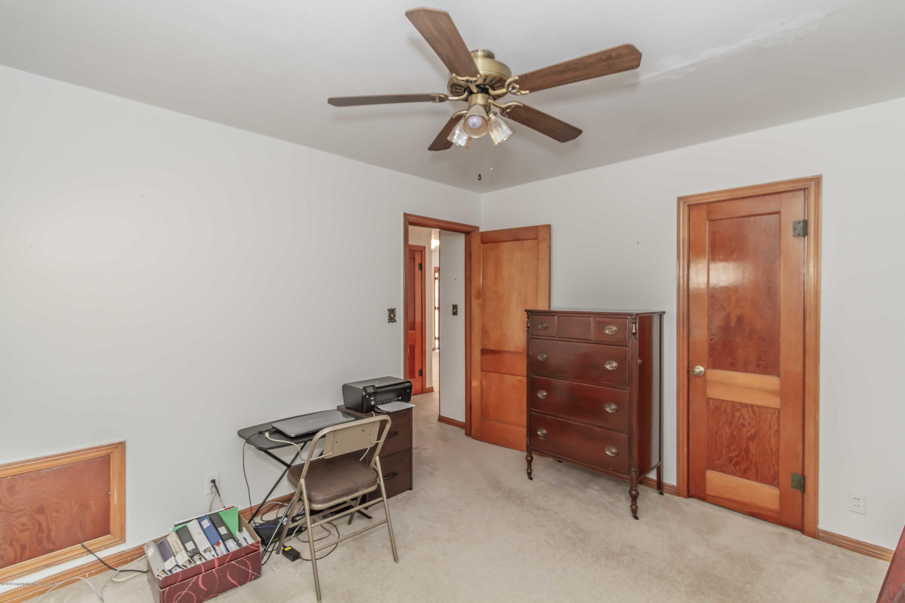 3613 Cline Road Amarillo, TX 79110 - Photo 25 of 36 a living room with furniture and a window