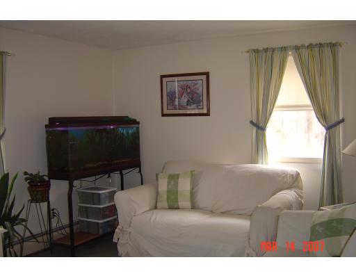 20 J Davis Road Charlton, MA 01507 - Photo 11 of 14 a living room with furniture and a window