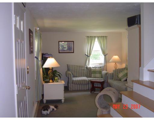 20 J Davis Road Charlton, MA 01507 - Photo 13 of 14 a living room with furniture and a window