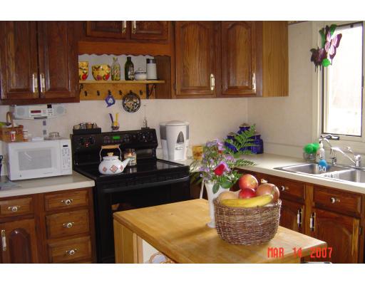 20 J Davis Road Charlton, MA 01507 - Photo 7 of 14 a room with a sink and cabinets