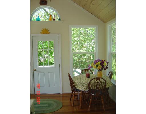 20 J Davis Road Charlton, MA 01507 - Photo 9 of 14 a dining room with furniture and a window