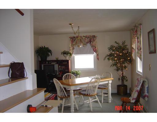 20 J Davis Road Charlton, MA 01507 - Photo 10 of 14 a view of a dining room with furniture and wooden floor