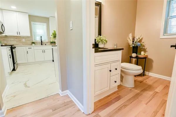 a bedroom with a bed and a view of bathroom