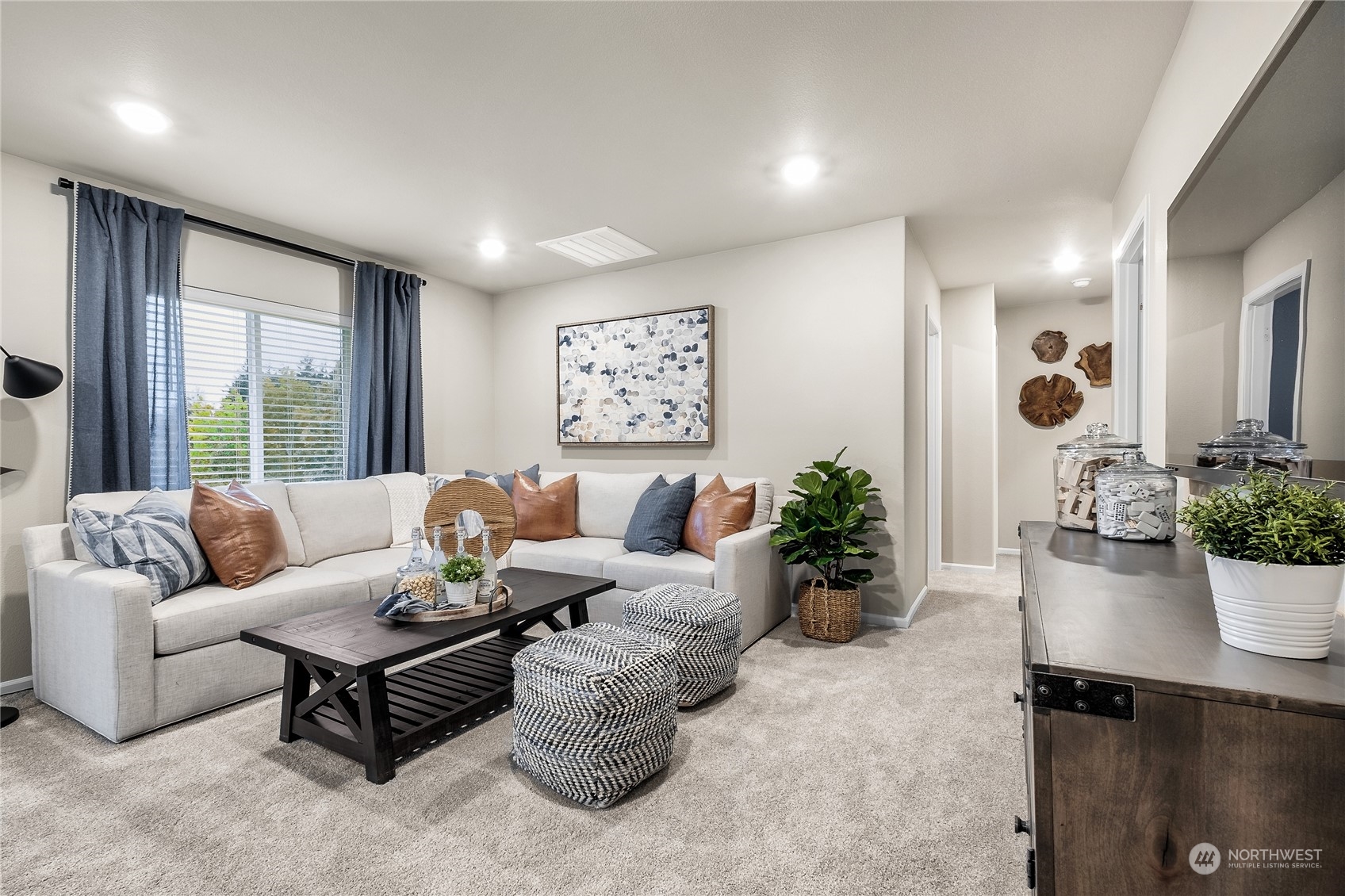 4019 233rd Street Southeast, Unit 9 Bothell, WA 98021 - Photo 8 of 18 a living room with furniture potted plant and a large window