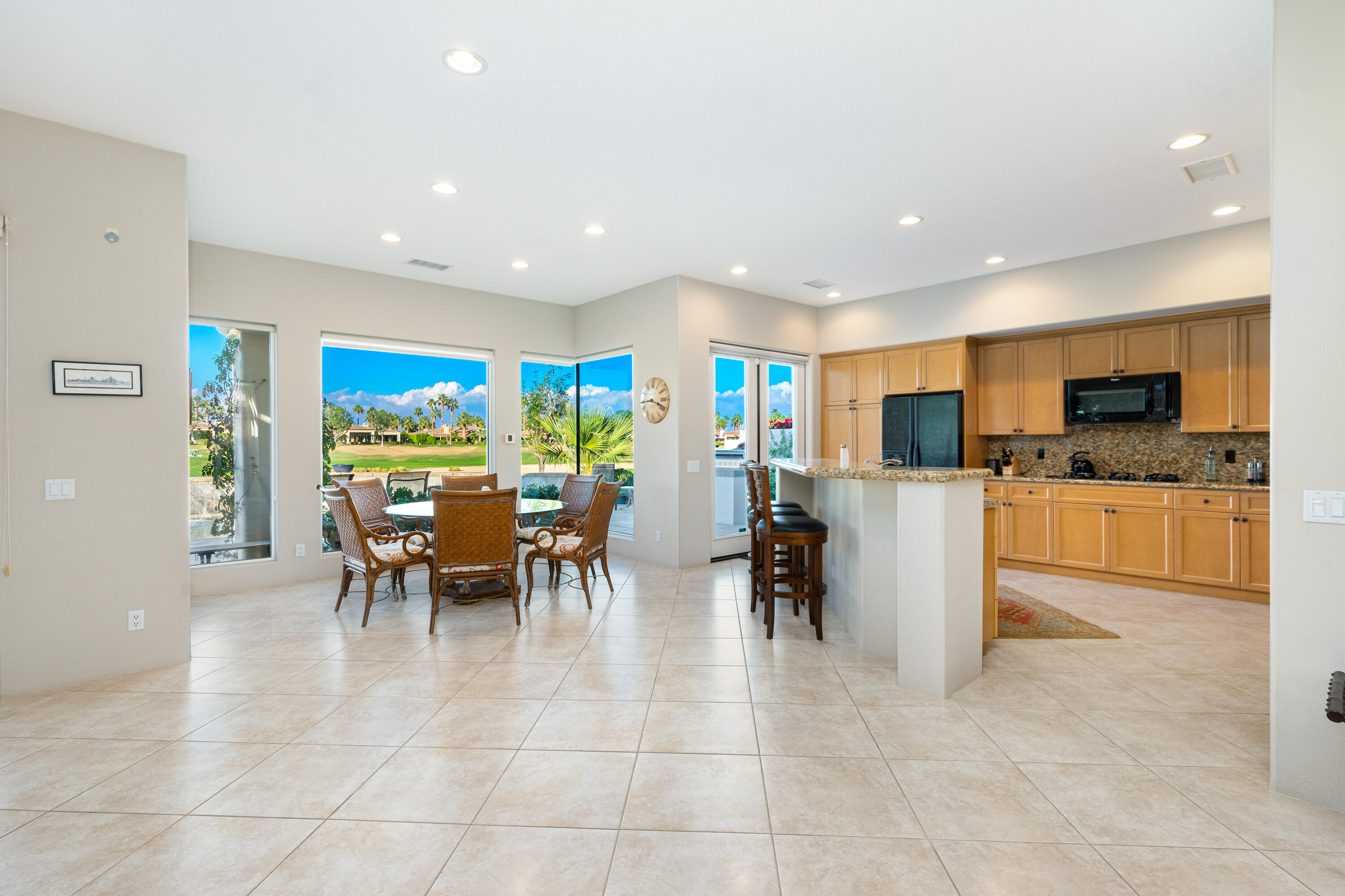 80824 Hermitage La Quinta, CA 92253 - Photo 16 of 49 a view of a kitchen with furniture and living room