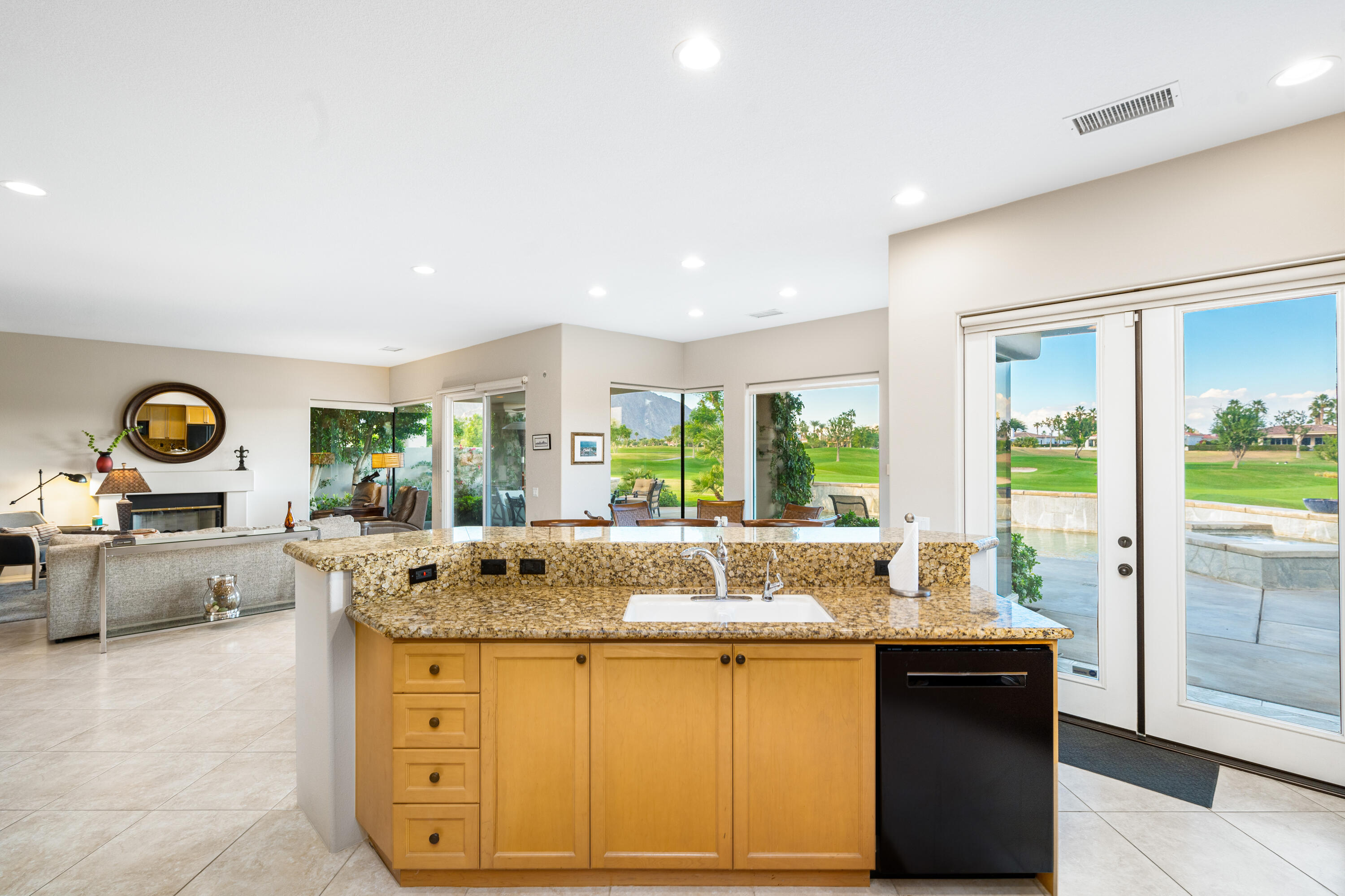 80824 Hermitage La Quinta, CA 92253 - Photo 21 of 49 a living room with furniture and a large window