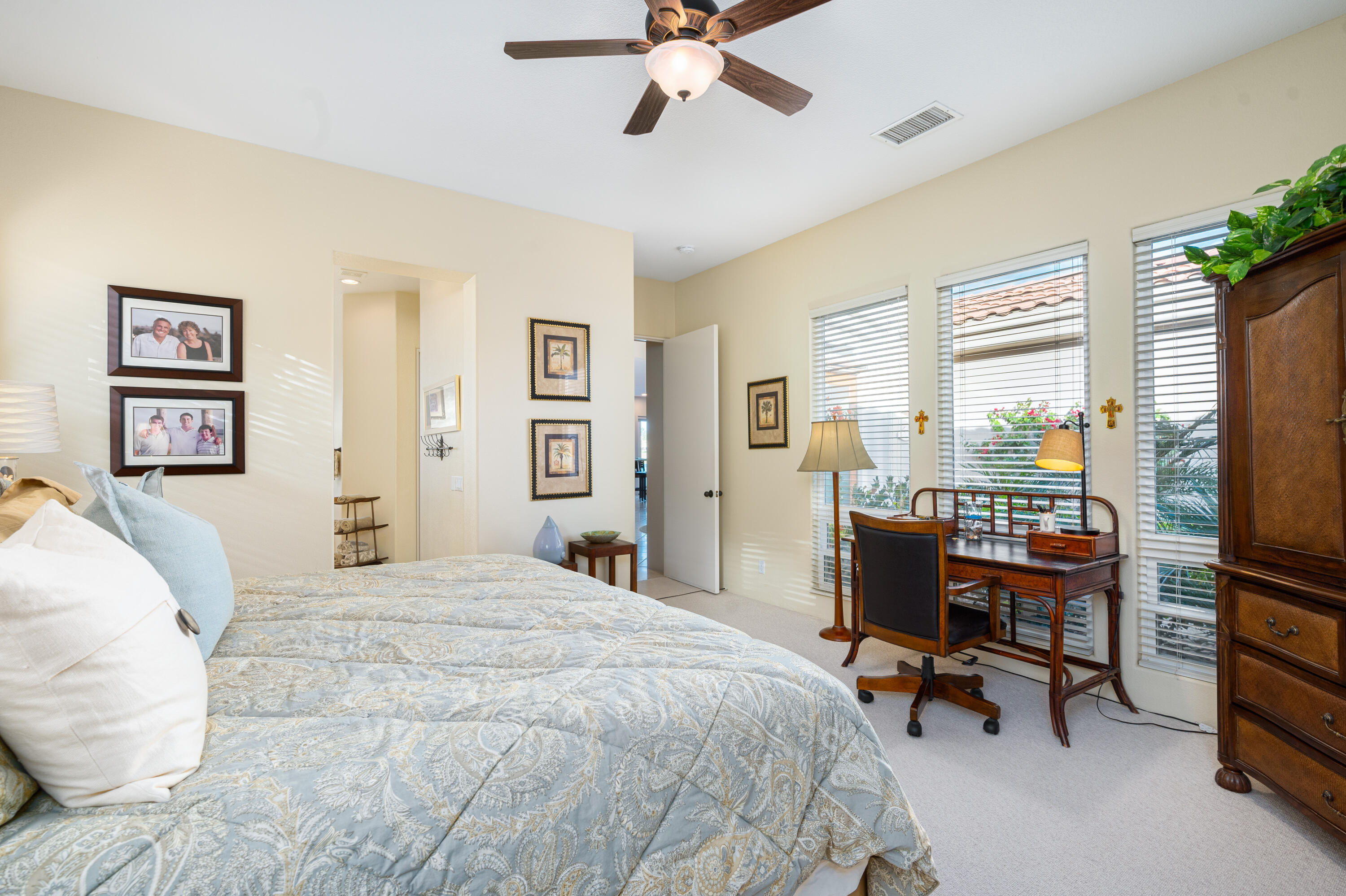 80824 Hermitage La Quinta, CA 92253 - Photo 23 of 49 a bedroom with a bed work place and a desk