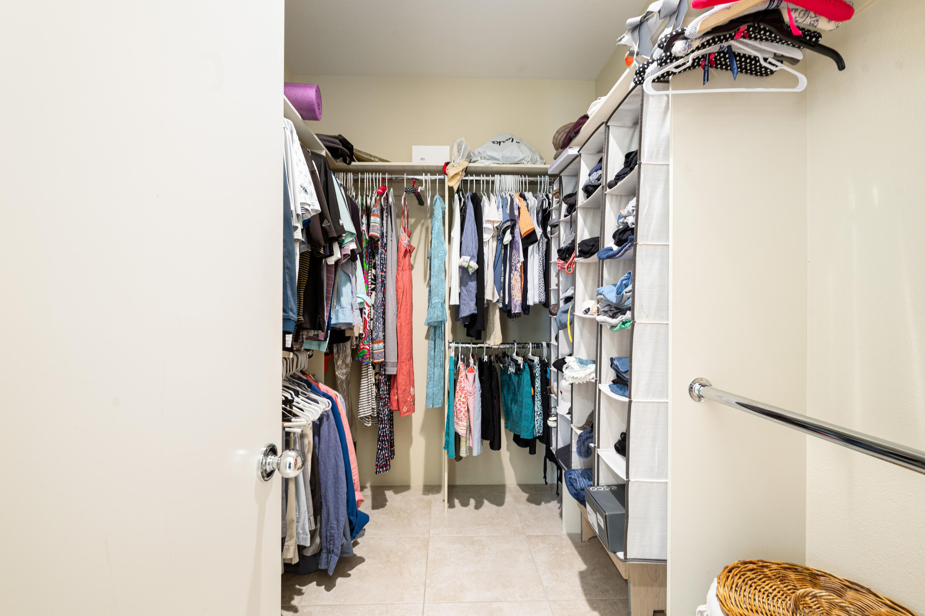 80824 Hermitage La Quinta, CA 92253 - Photo 26 of 49 a view of walk in closet with clothes and shoes