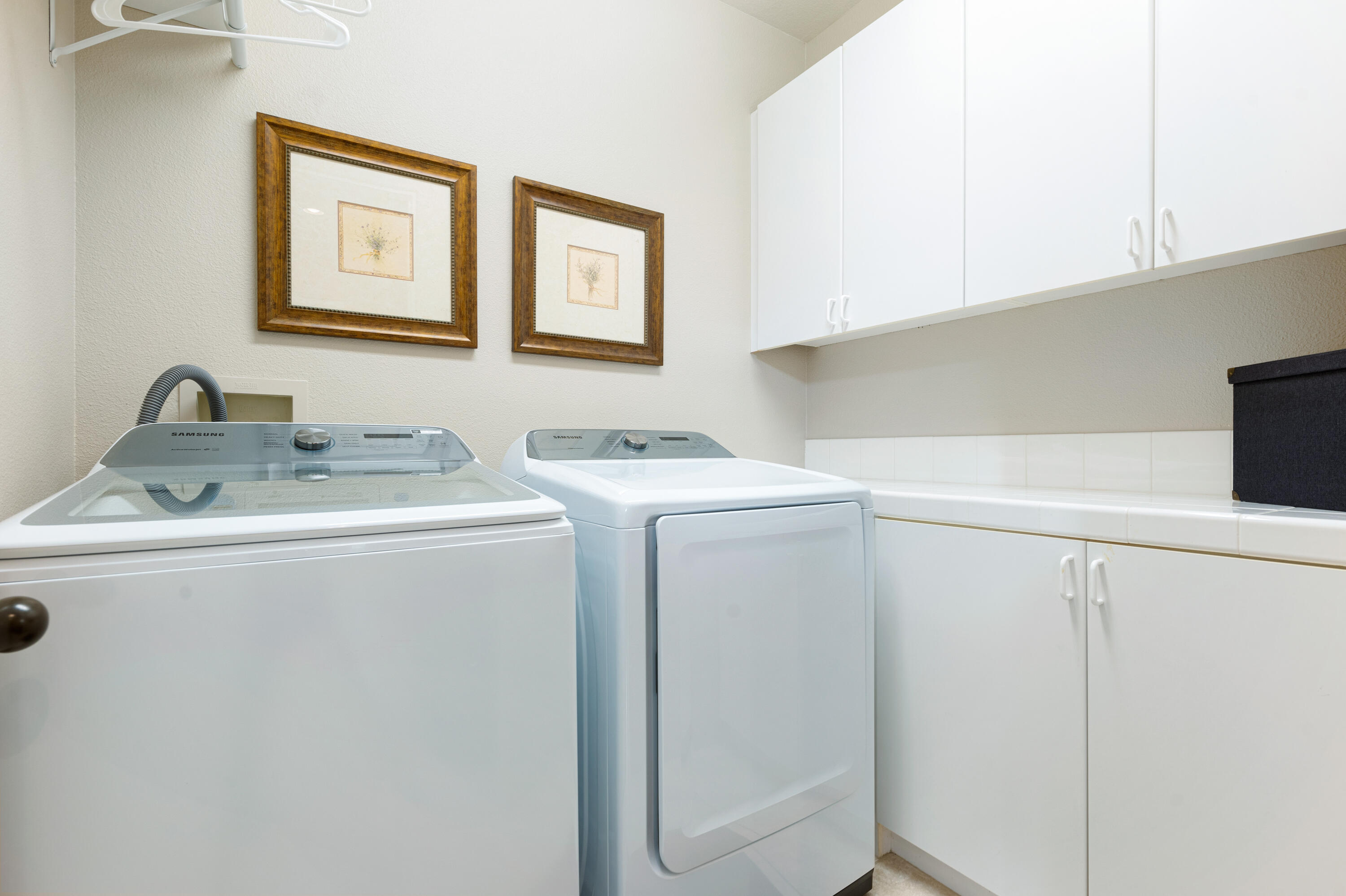 80824 Hermitage La Quinta, CA 92253 - Photo 29 of 49 a utility room with dryer and washer