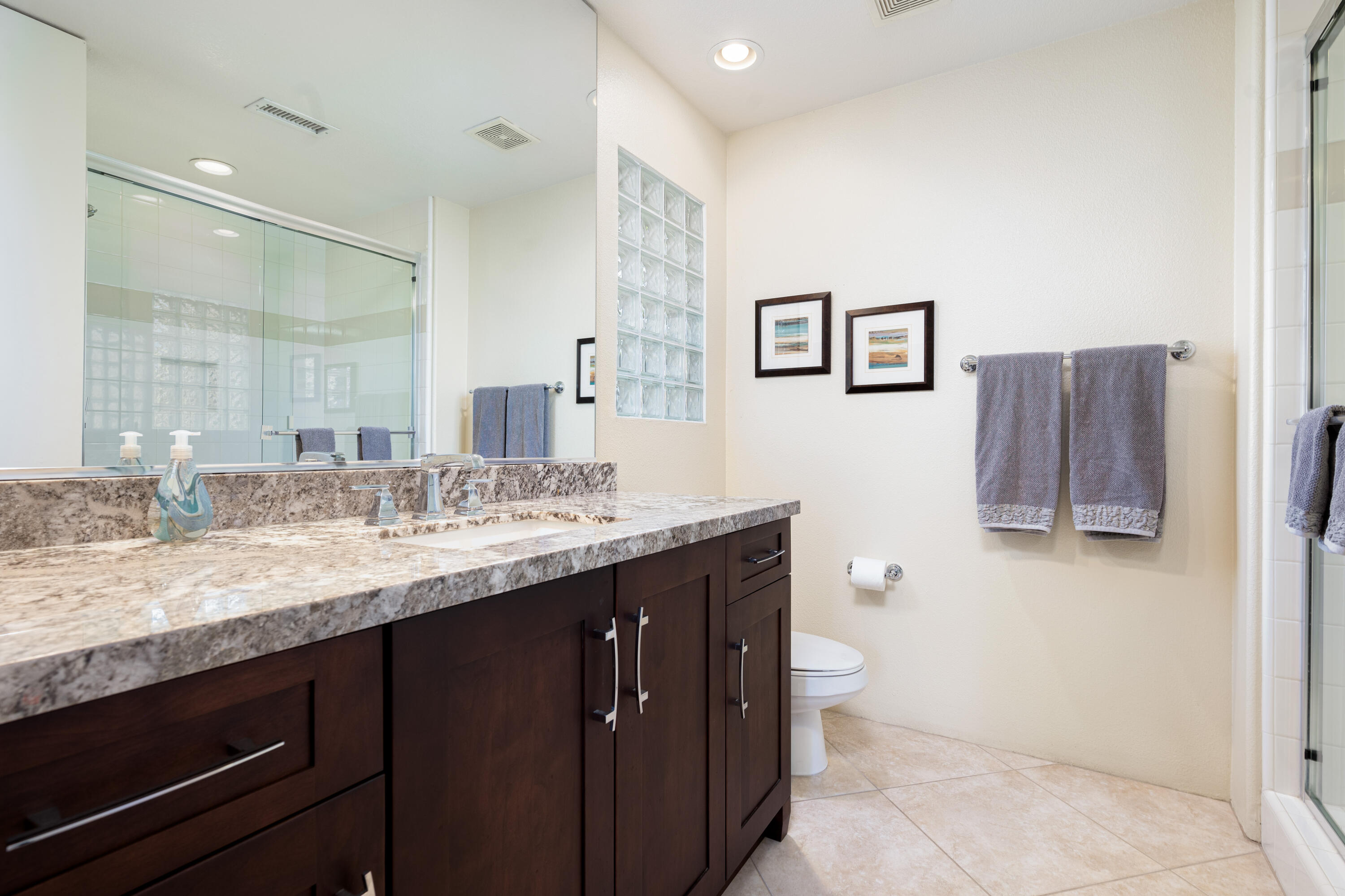80824 Hermitage La Quinta, CA 92253 - Photo 32 of 49 a bathroom with a granite countertop sink mirror and toilet
