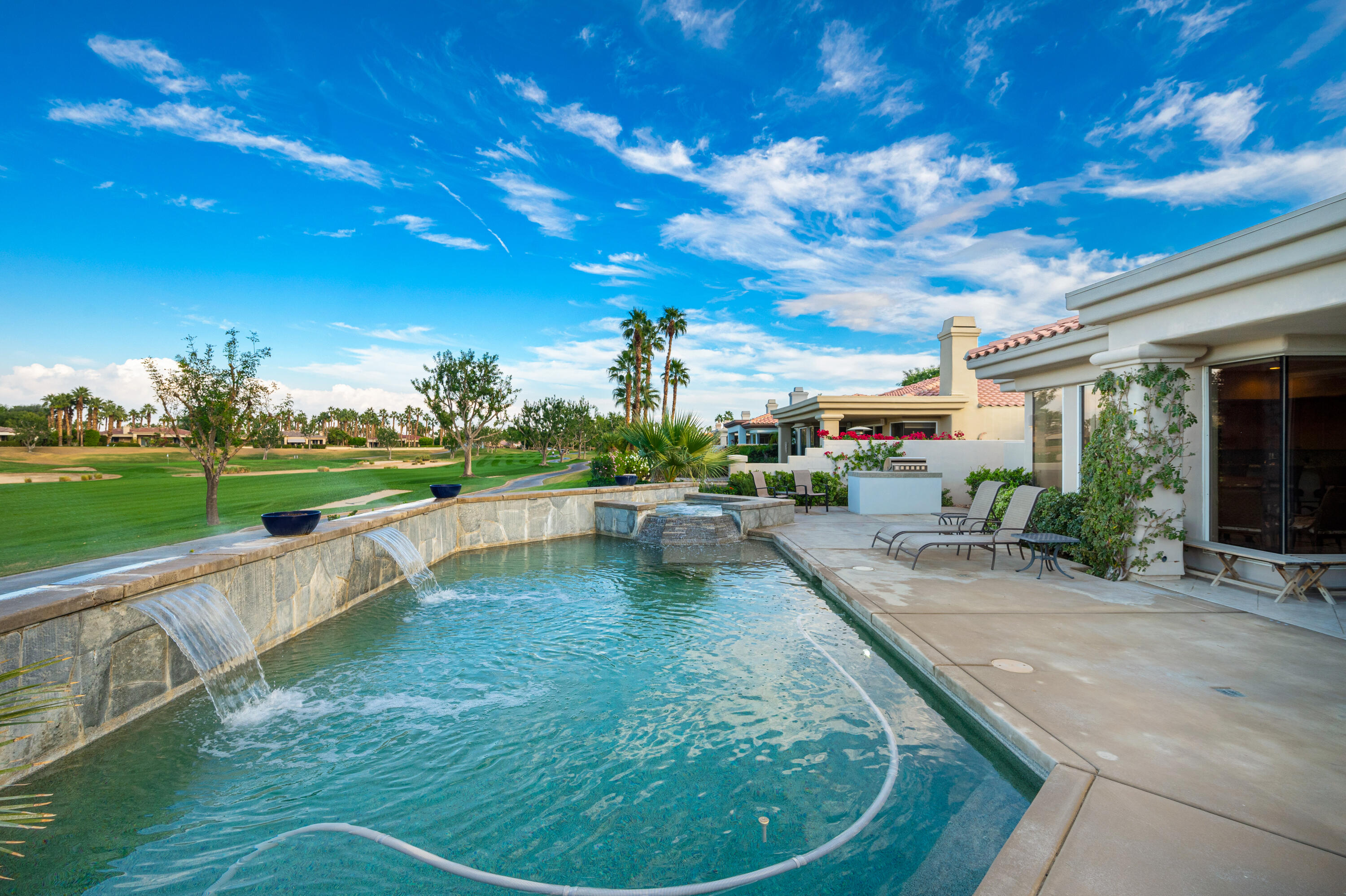 80824 Hermitage La Quinta, CA 92253 - Photo 37 of 49 a view of a swimming pool with a patio