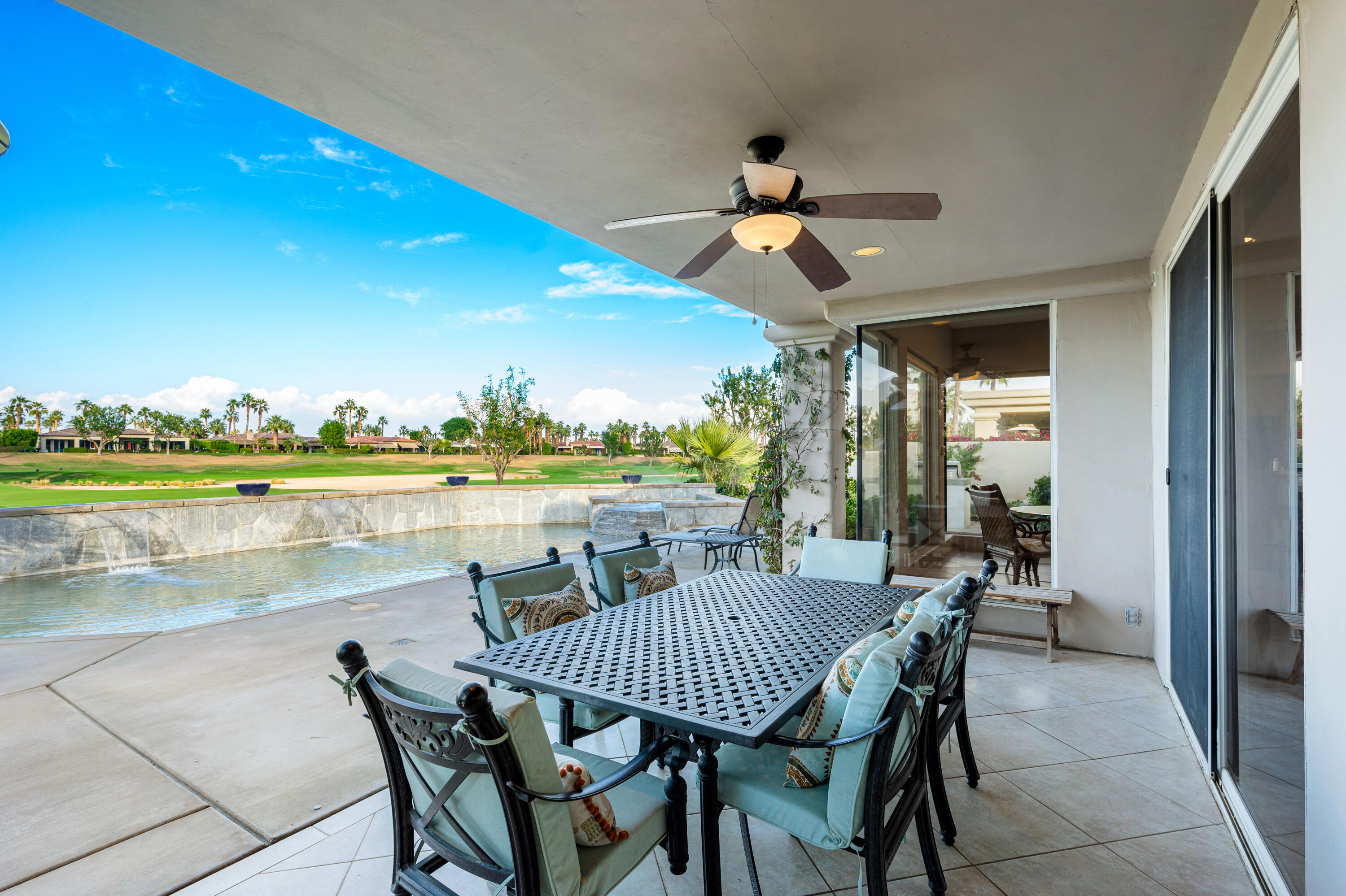 80824 Hermitage La Quinta, CA 92253 - Photo 40 of 49 a view of a patio with a table and chairs