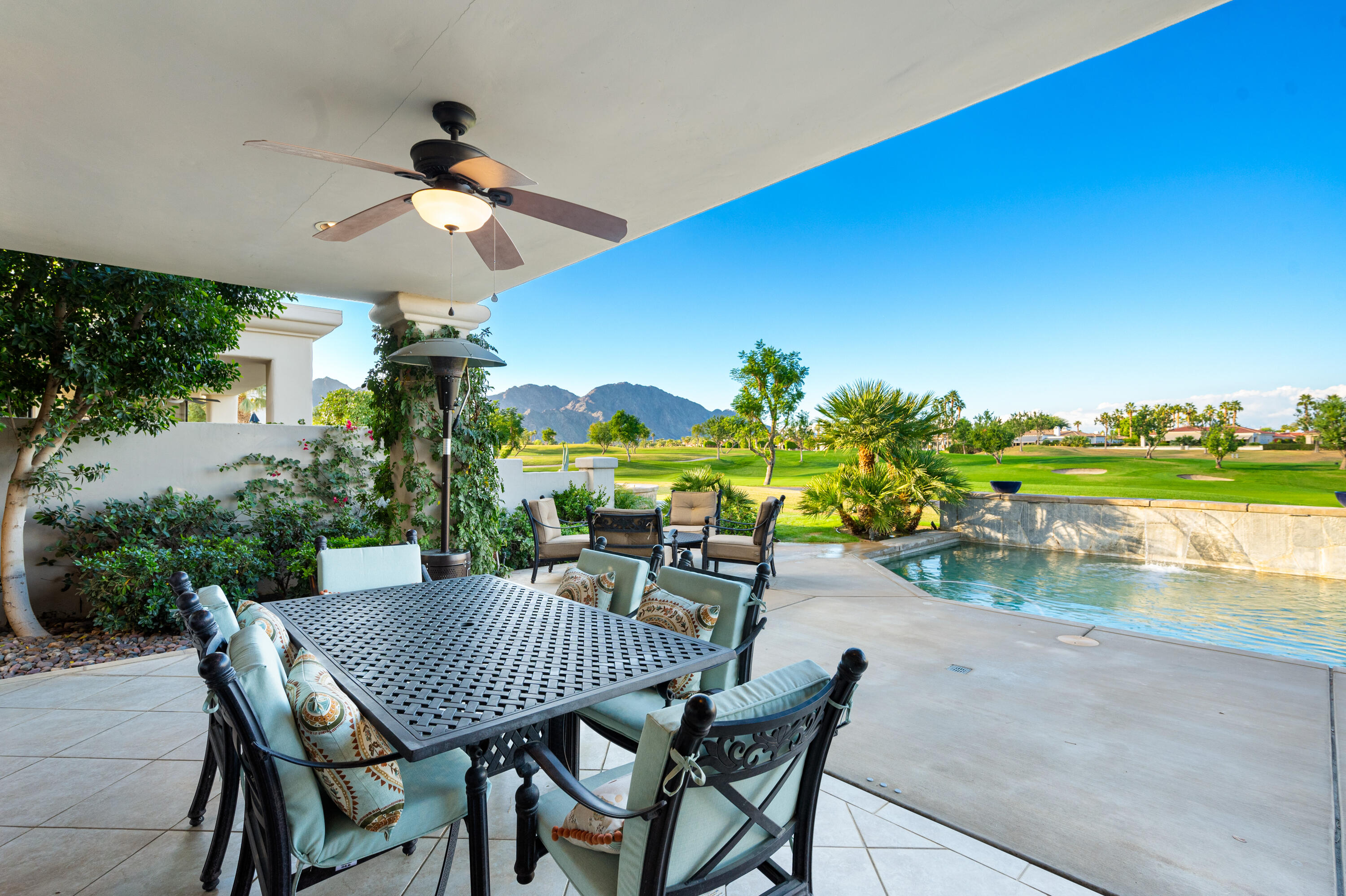 80824 Hermitage La Quinta, CA 92253 - Photo 41 of 49 a view of a patio with a table & chairs