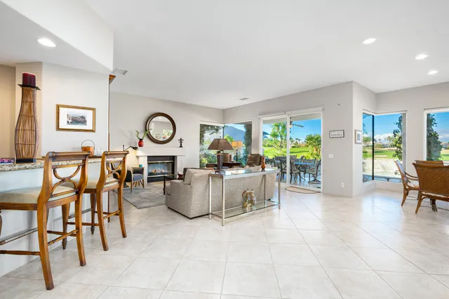 a view of a livingroom with furniture and window