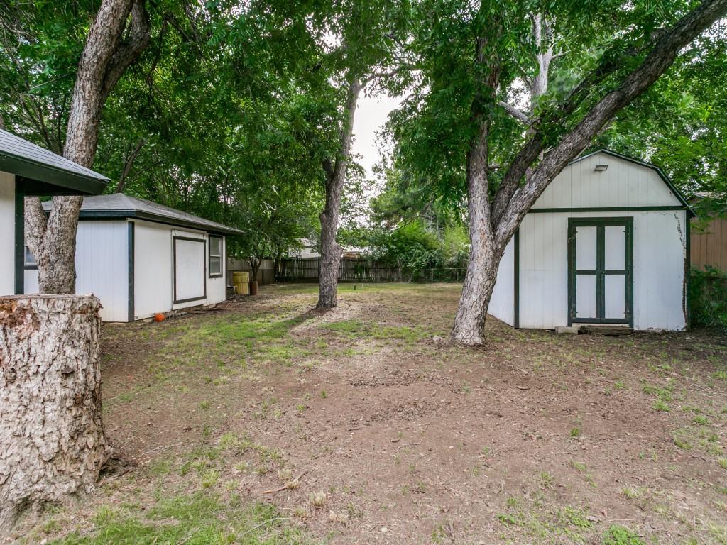 429 Harmon Road Hurst, TX 76053 - Photo 16 of 17 HUGE back yard with storage sheds