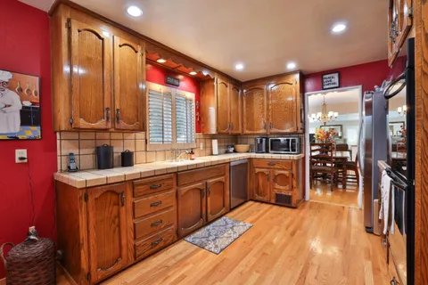 a kitchen with lots of counter top space and center island