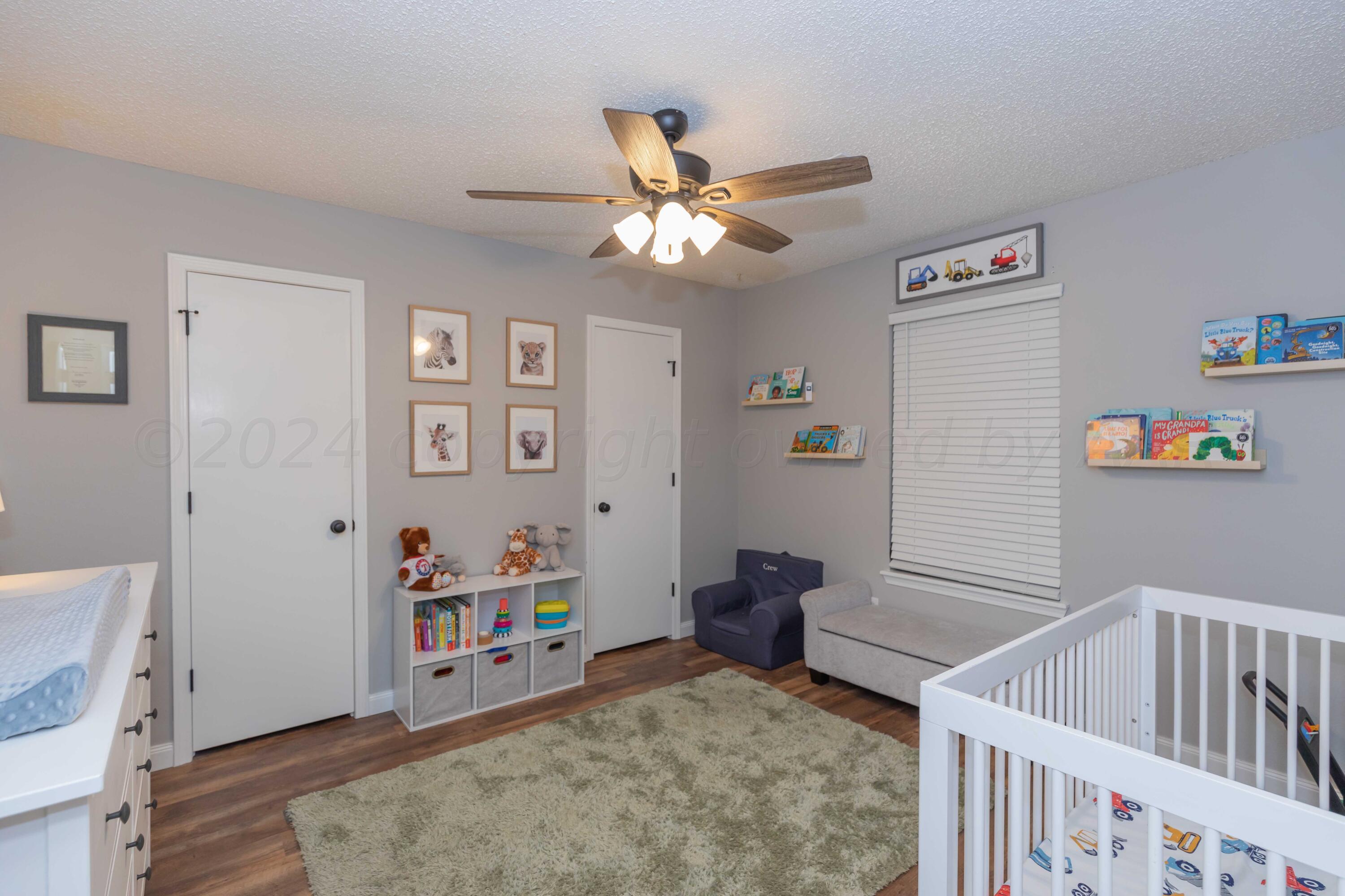 5804 Oakman Drive Amarillo, TX 79109 - Photo 36 of 48 a bedroom with furniture and a window