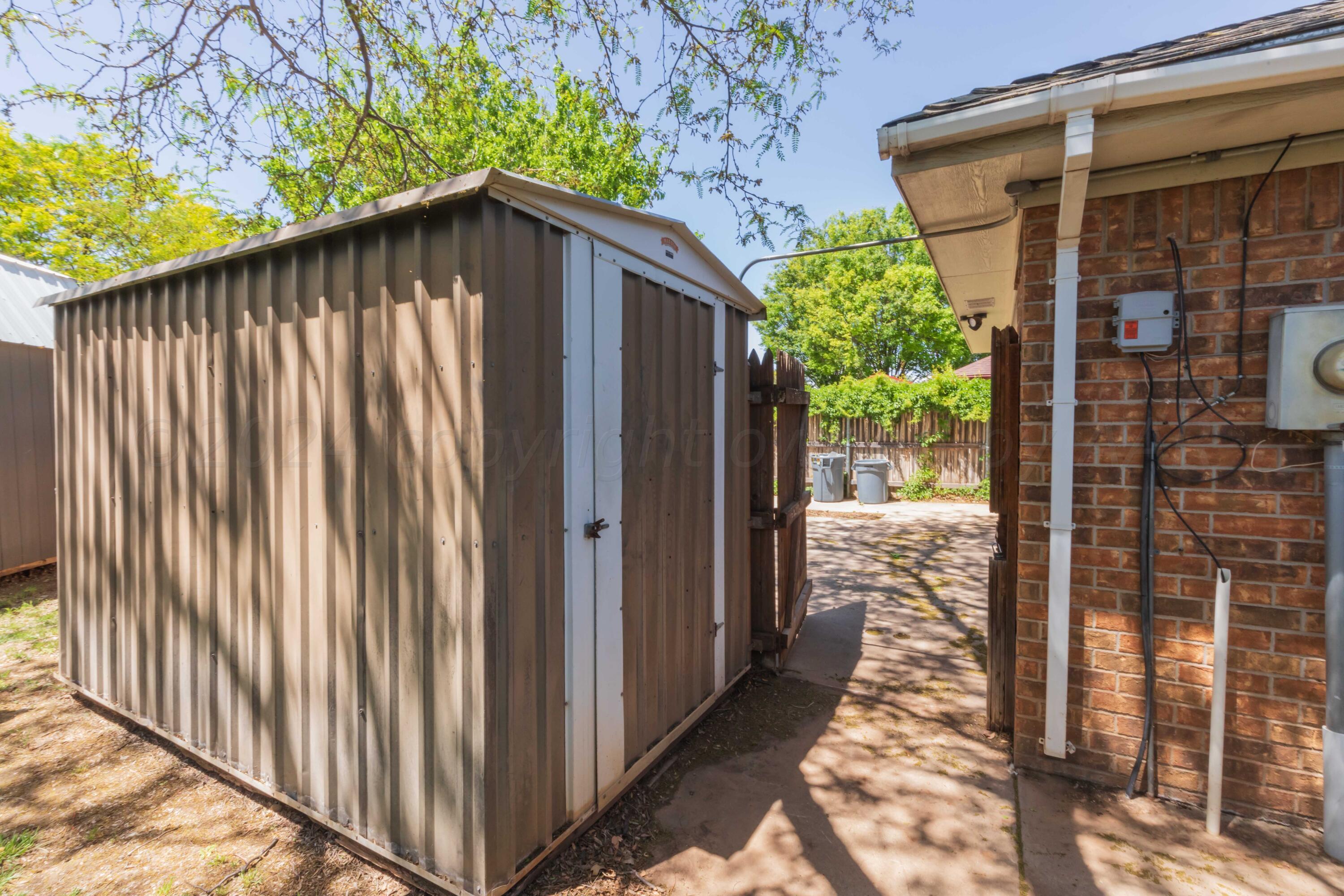 5804 Oakman Drive Amarillo, TX 79109 - Photo 47 of 48 a view of a house with wooden fence