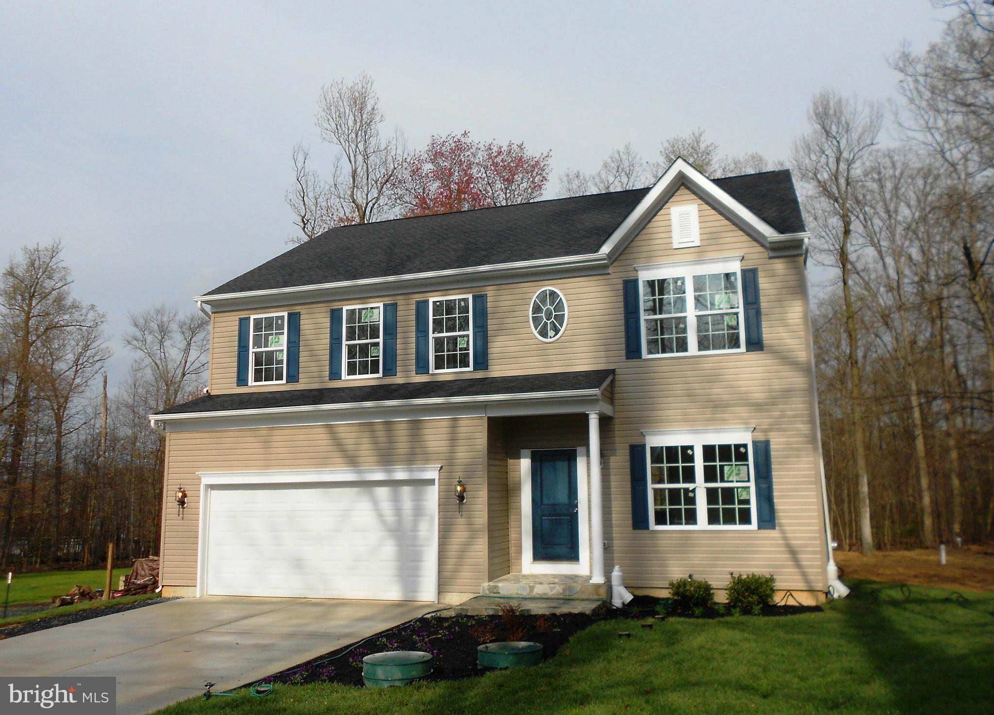 1805 Van Bibber Road Edgewood, MD 21040 - Photo 1 of 30 a front view of a house with a yard and garage