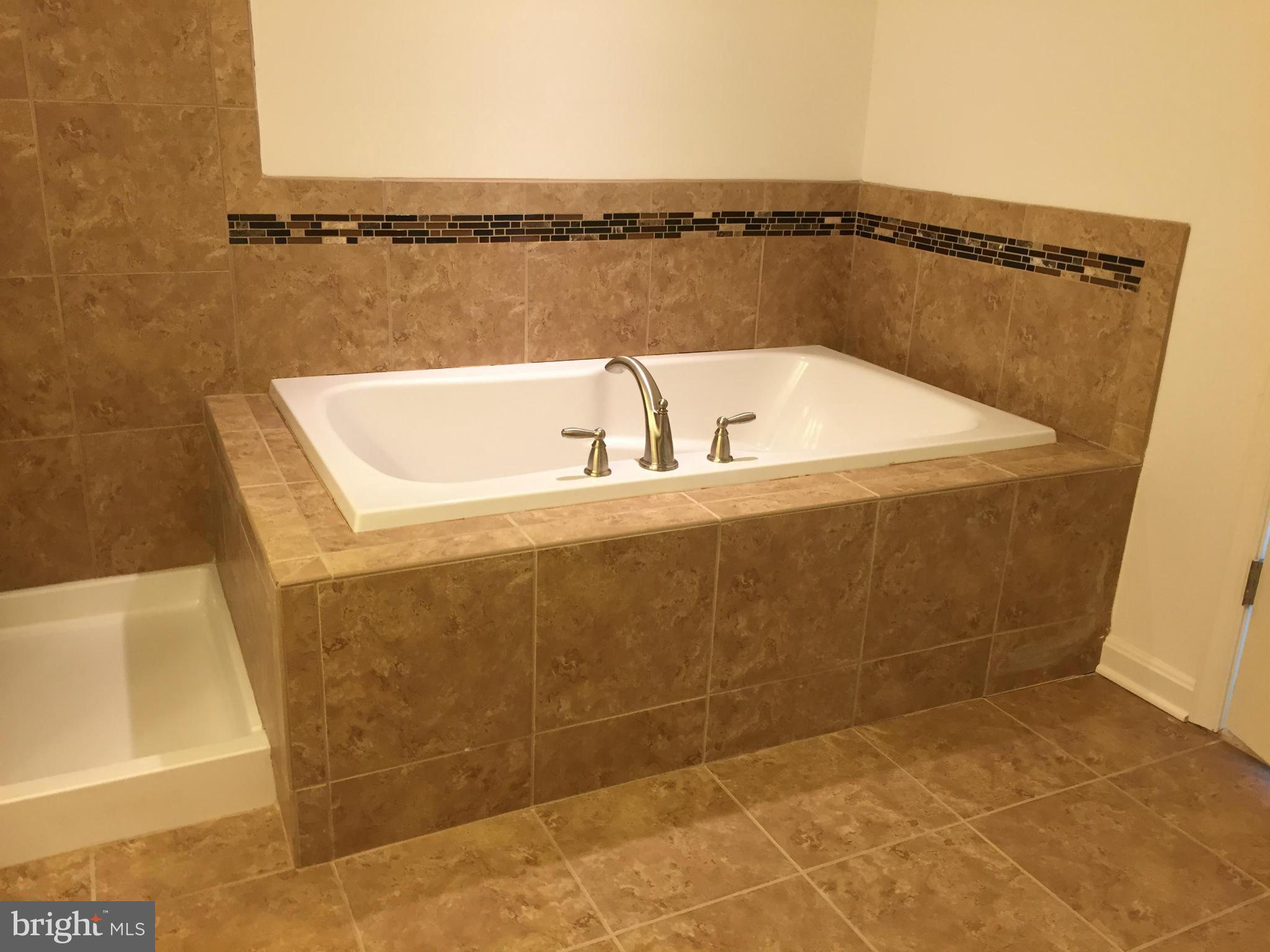 1805 Van Bibber Road Edgewood, MD 21040 - Photo 17 of 30 a bathroom with a bathtub