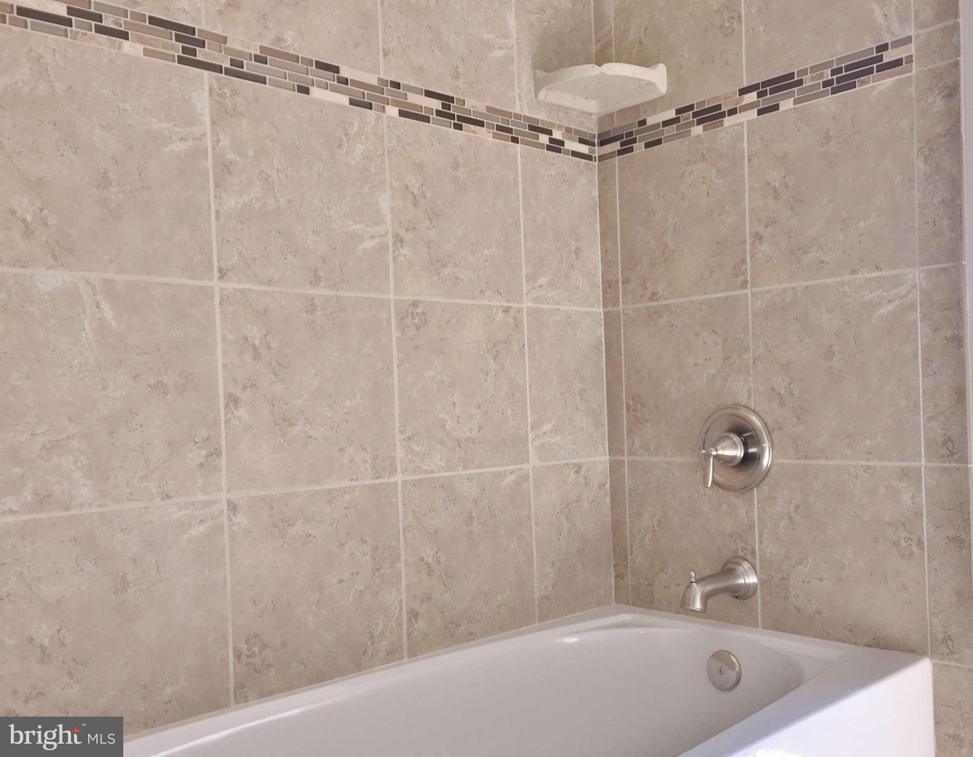 1805 Van Bibber Road Edgewood, MD 21040 - Photo 21 of 30 a bathroom with a shower and a bathtub