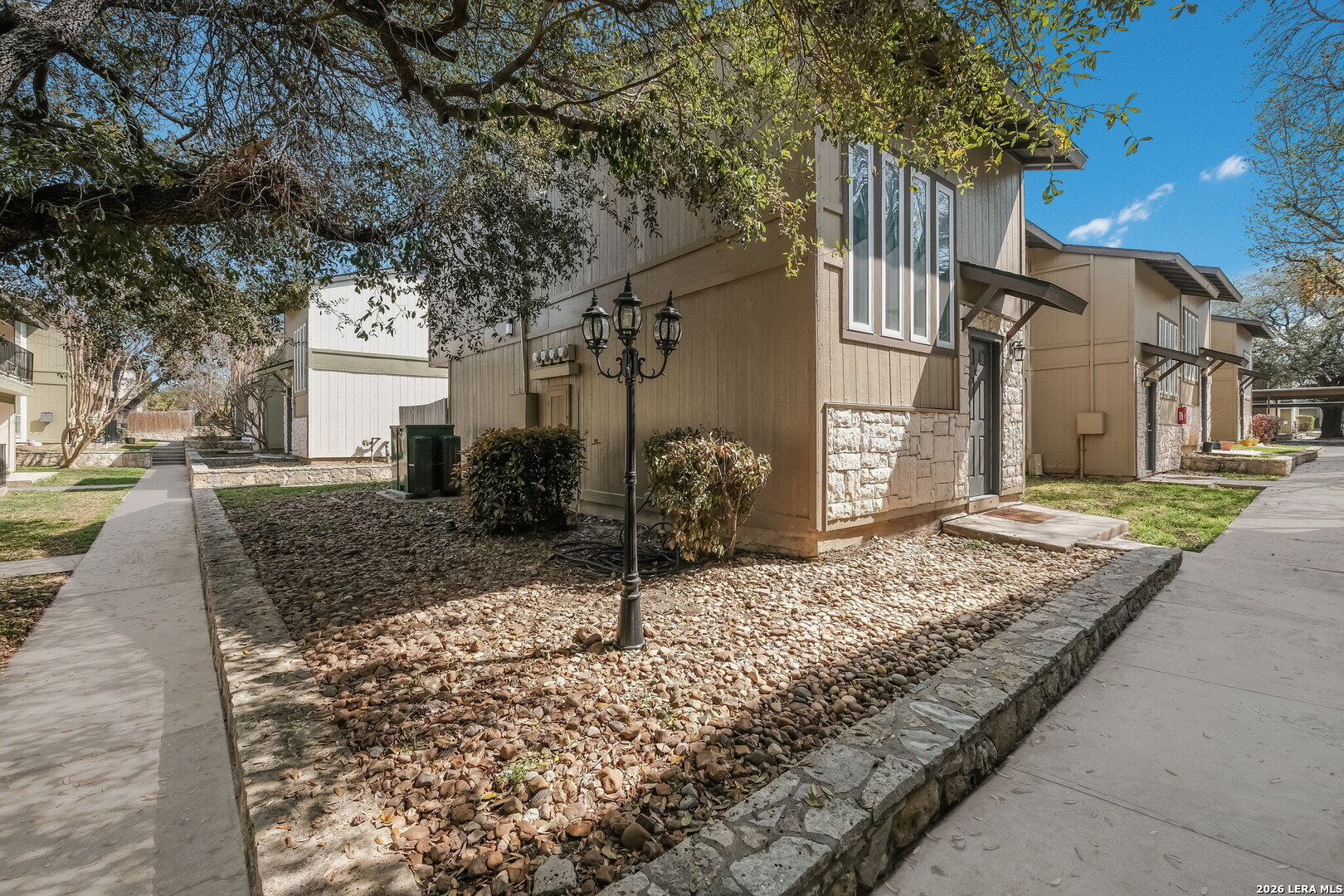 100 Lorenz Road, Unit 804 San Antonio, TX 78209 - Photo 1 of 12 a view of a house with a yard