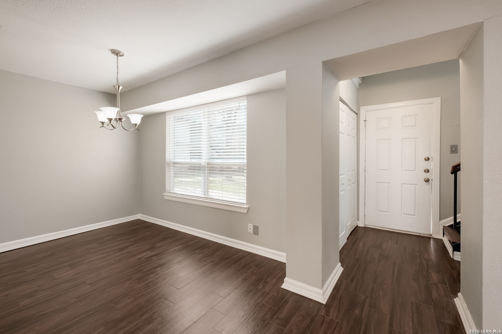 100 Lorenz Road, Unit 804 San Antonio, TX 78209 - Photo 2 of 12 a view of a room with wooden floor and windows