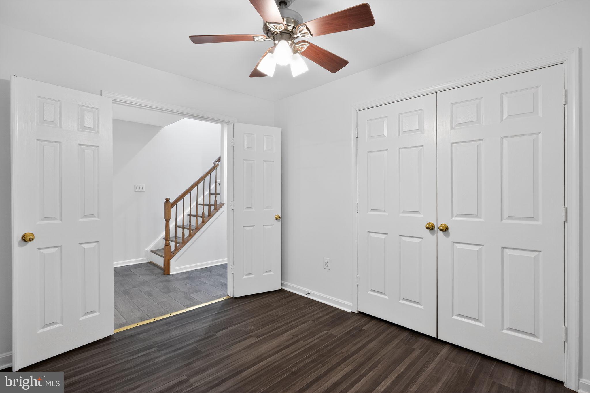 9745 Quiet Brook Lane Clinton, MD 20735 - Photo 30 of 43 a view of an entryway with wooden floor
