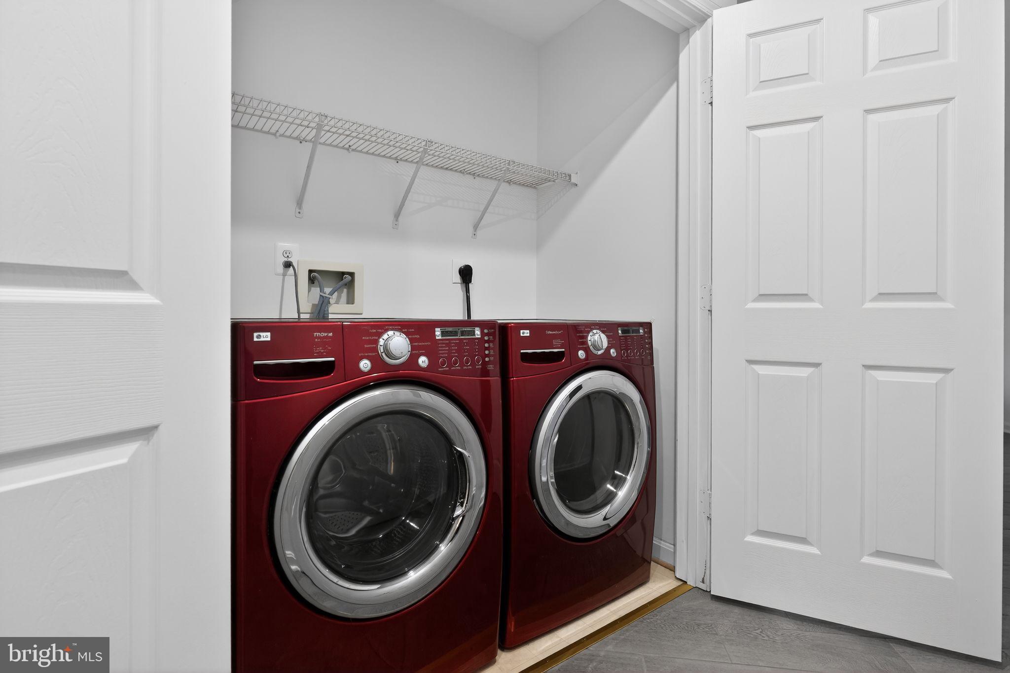 9745 Quiet Brook Lane Clinton, MD 20735 - Photo 39 of 43 a utility room with dryer and washer