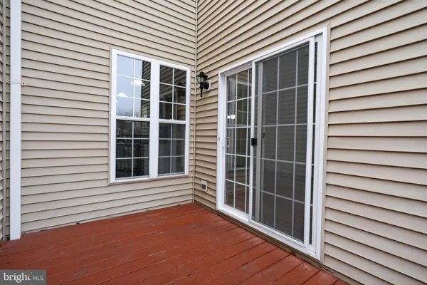 a view of front door with wooden floor