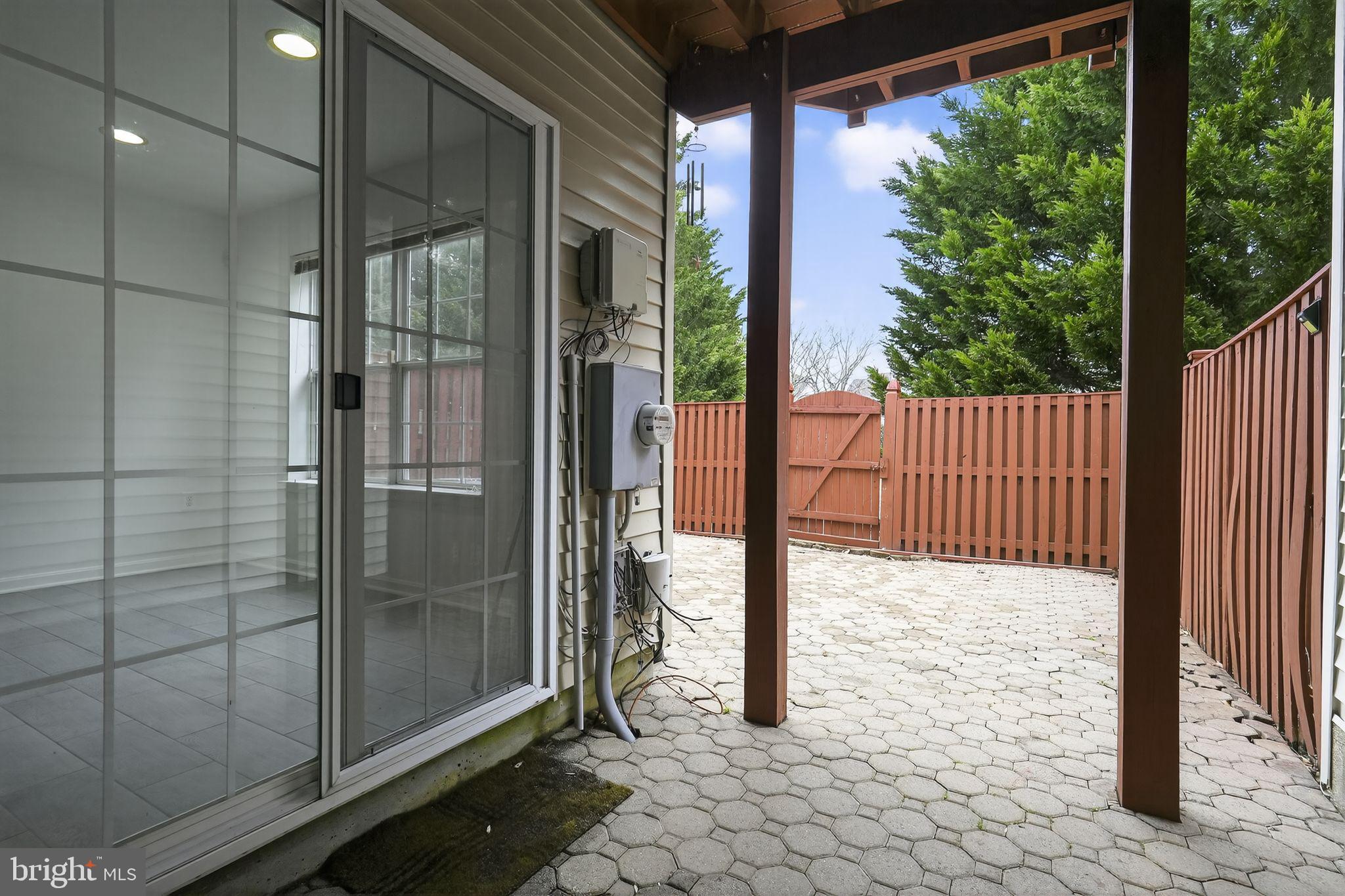 9745 Quiet Brook Lane Clinton, MD 20735 - Photo 7 of 43 a view of a glass door