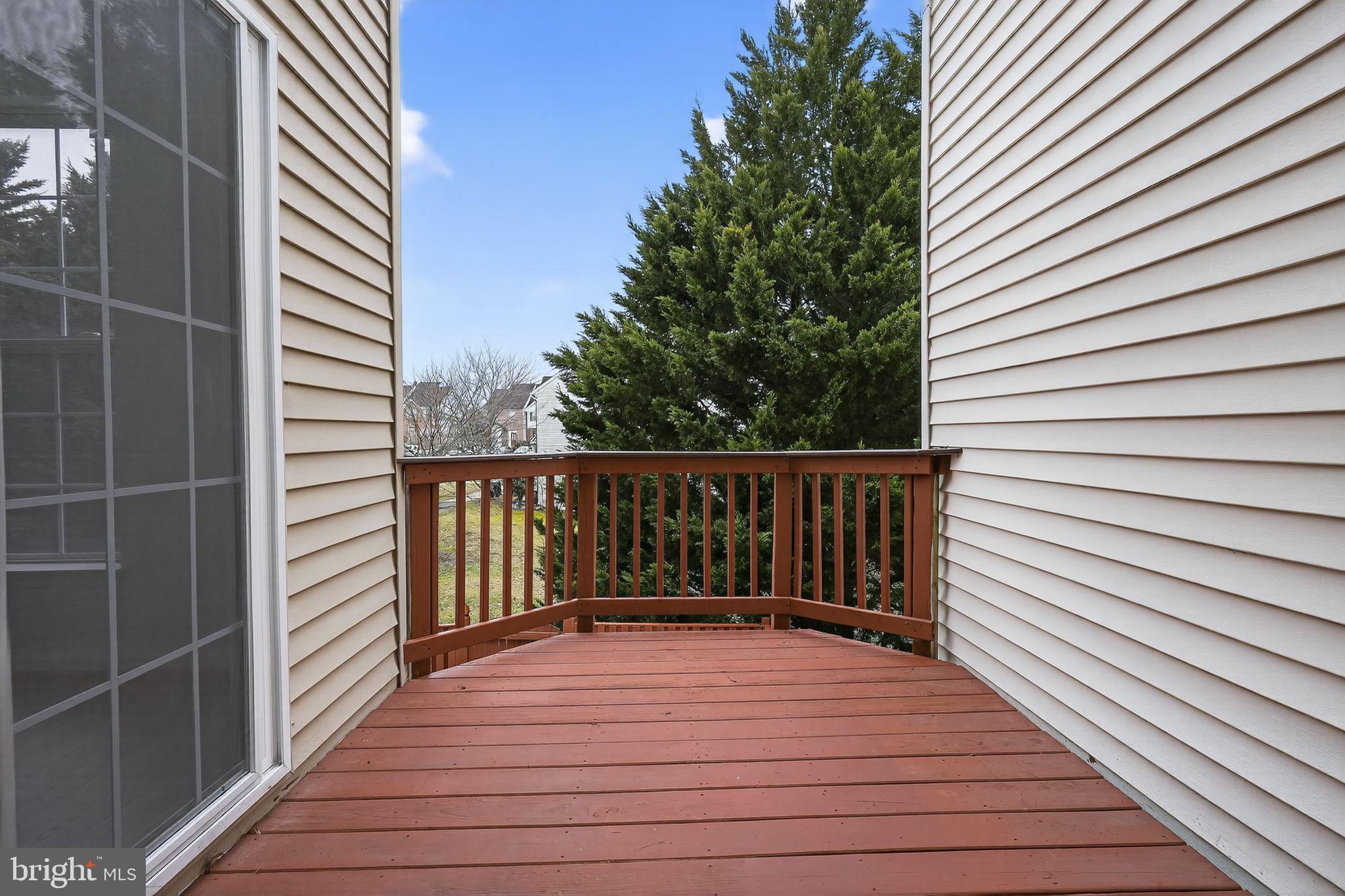 9745 Quiet Brook Lane Clinton, MD 20735 - Photo 8 of 43 a view of balcony and deck