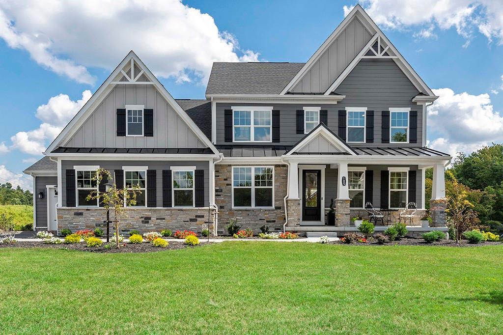 105 Abigail Drive Mars, PA 16046 - Photo 1 of 50 a front view of a house with a yard