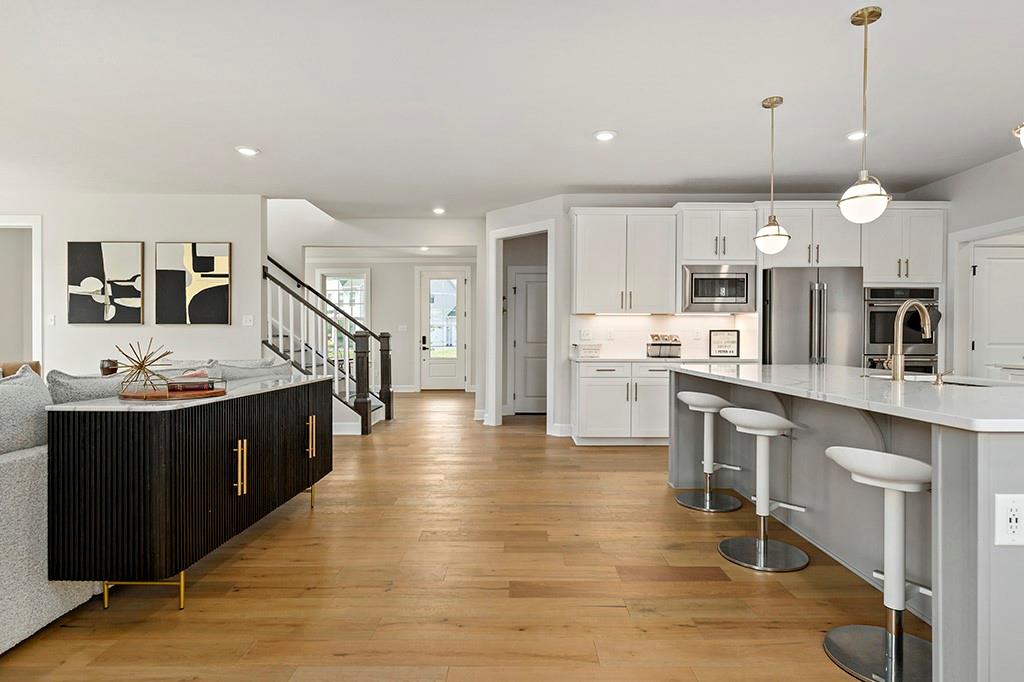 105 Abigail Drive Mars, PA 16046 - Photo 17 of 50 a large kitchen with a table and chairs