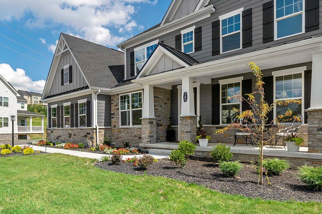105 Abigail Drive Mars, PA 16046 - Photo 2 of 50 a front view of a house with swimming pool and glass windows