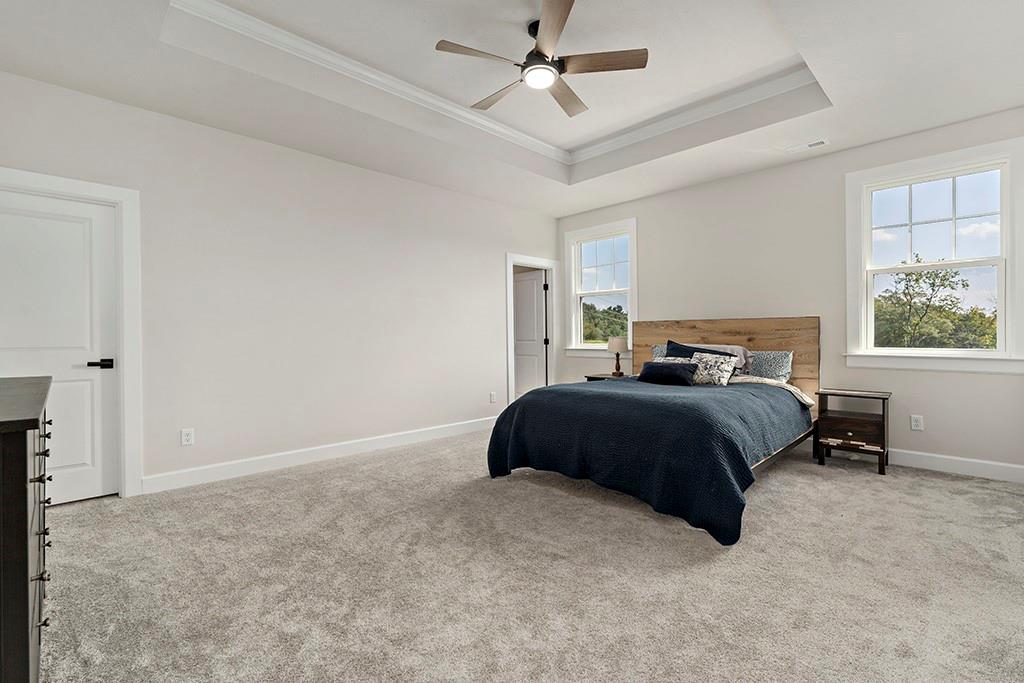 105 Abigail Drive Mars, PA 16046 - Photo 29 of 50 a bedroom with a large bed and a window