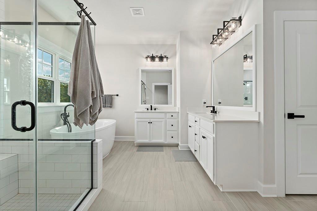 105 Abigail Drive Mars, PA 16046 - Photo 32 of 50 a bathroom with a sink a toilet and mirror