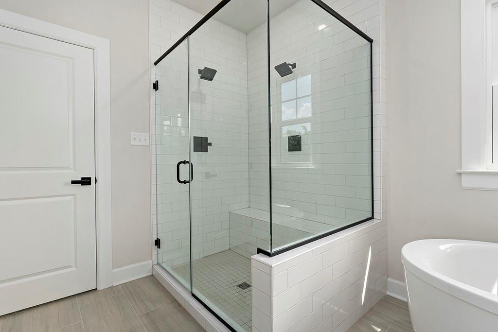 105 Abigail Drive Mars, PA 16046 - Photo 34 of 50 a bathroom with a shower and a toilet