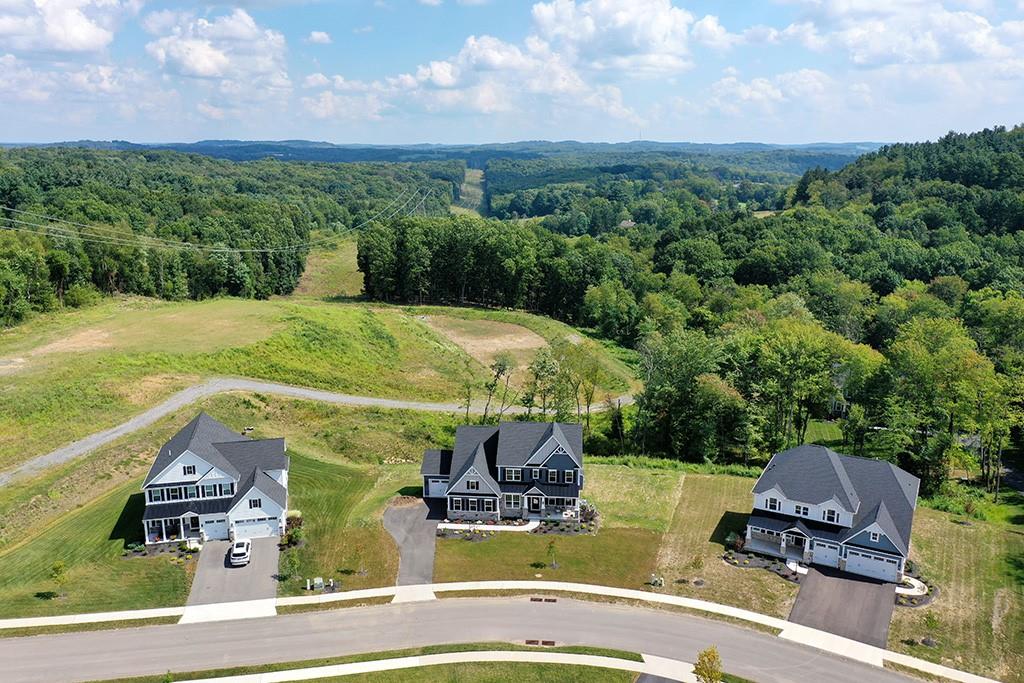 105 Abigail Drive Mars, PA 16046 - Photo 4 of 50 an aerial view of residential houses with outdoor space and trees