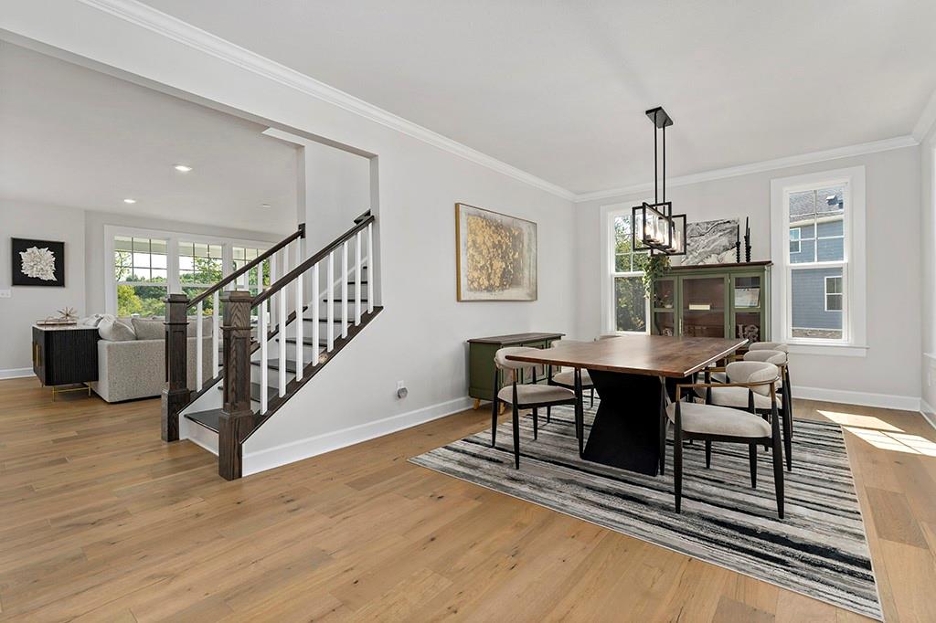 105 Abigail Drive Mars, PA 16046 - Photo 8 of 50 a view of a dining room with furniture window and wooden floor