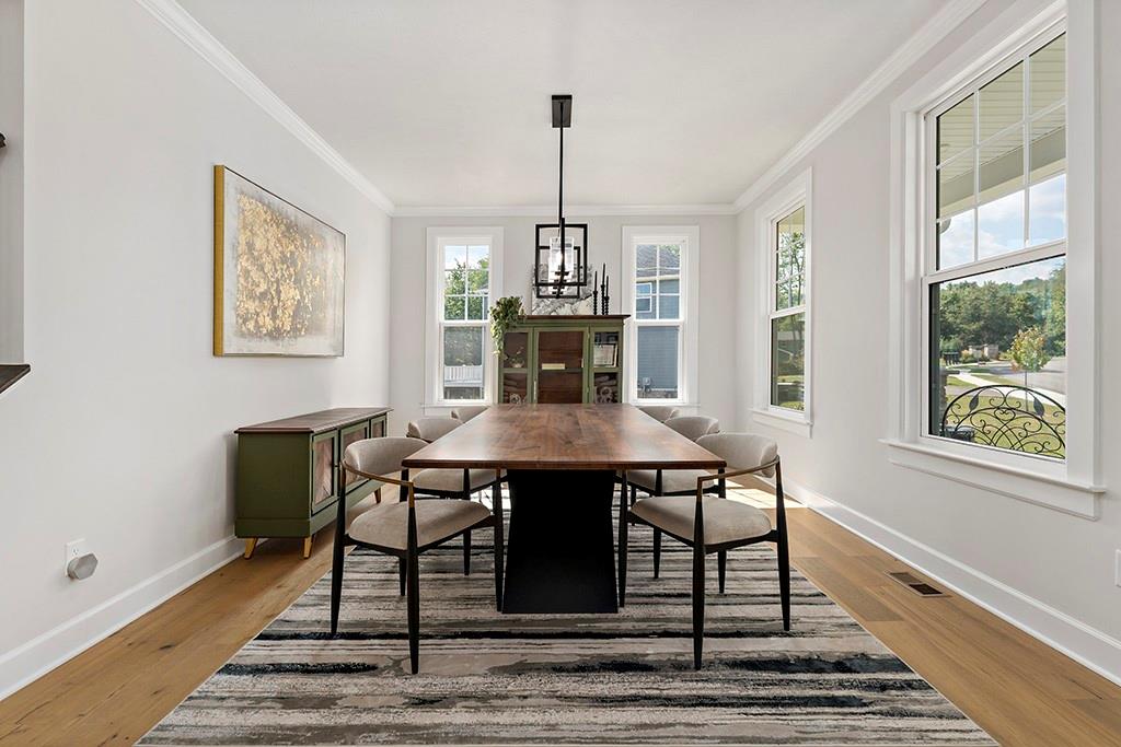 105 Abigail Drive Mars, PA 16046 - Photo 10 of 50 a view of a dining room with furniture window and wooden floor