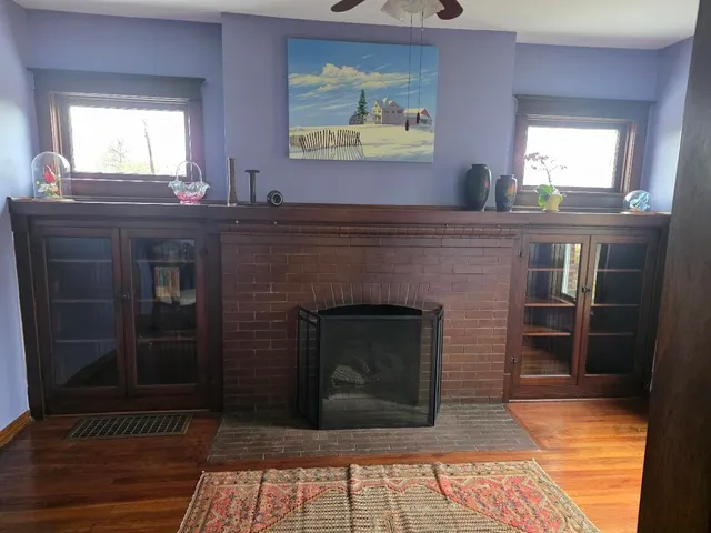 a kitchen with stainless steel appliances granite countertop a sink a stove and cabinets