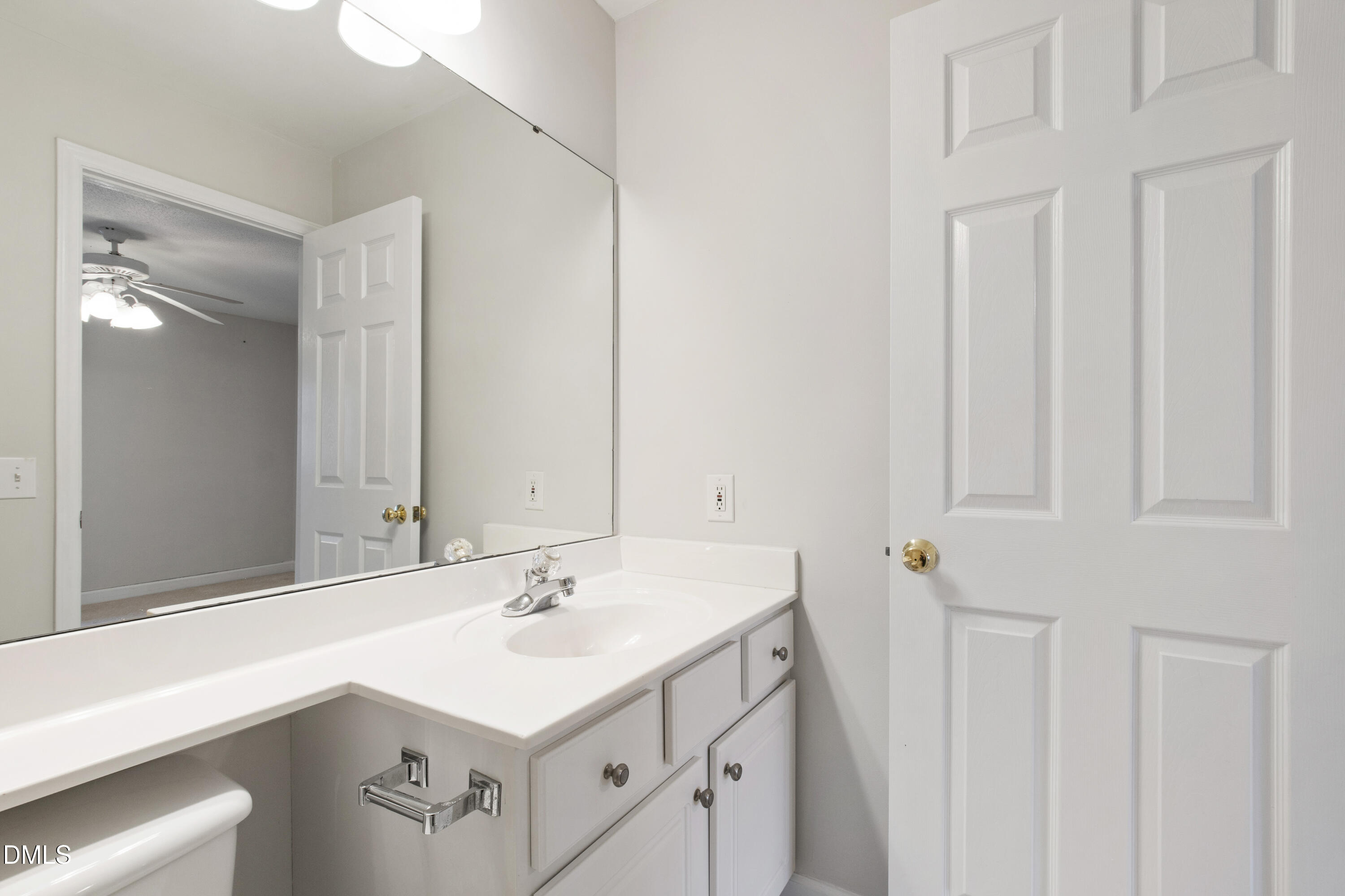 1210 Westview Lane, Unit 303 Raleigh, NC 27605 - Photo 16 of 27 a bathroom with a sink and a mirror