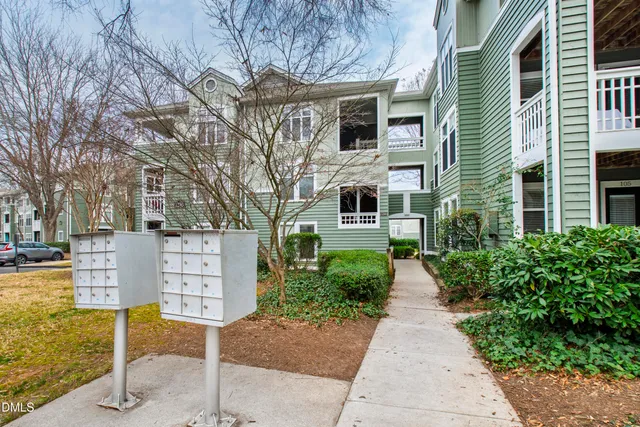 a front view of a house with a garage