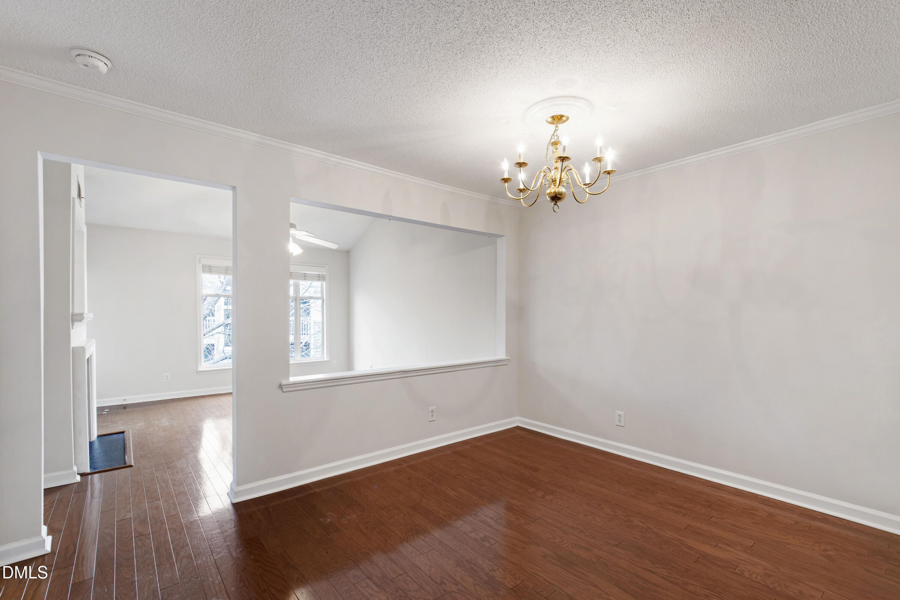 1210 Westview Lane, Unit 303 Raleigh, NC 27605 - Photo 5 of 27 wooden floor in an empty room with a window