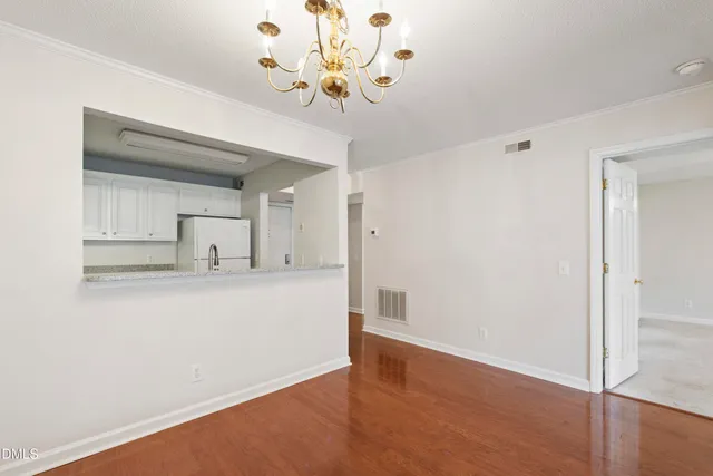 a view of kitchen with wooden floor
